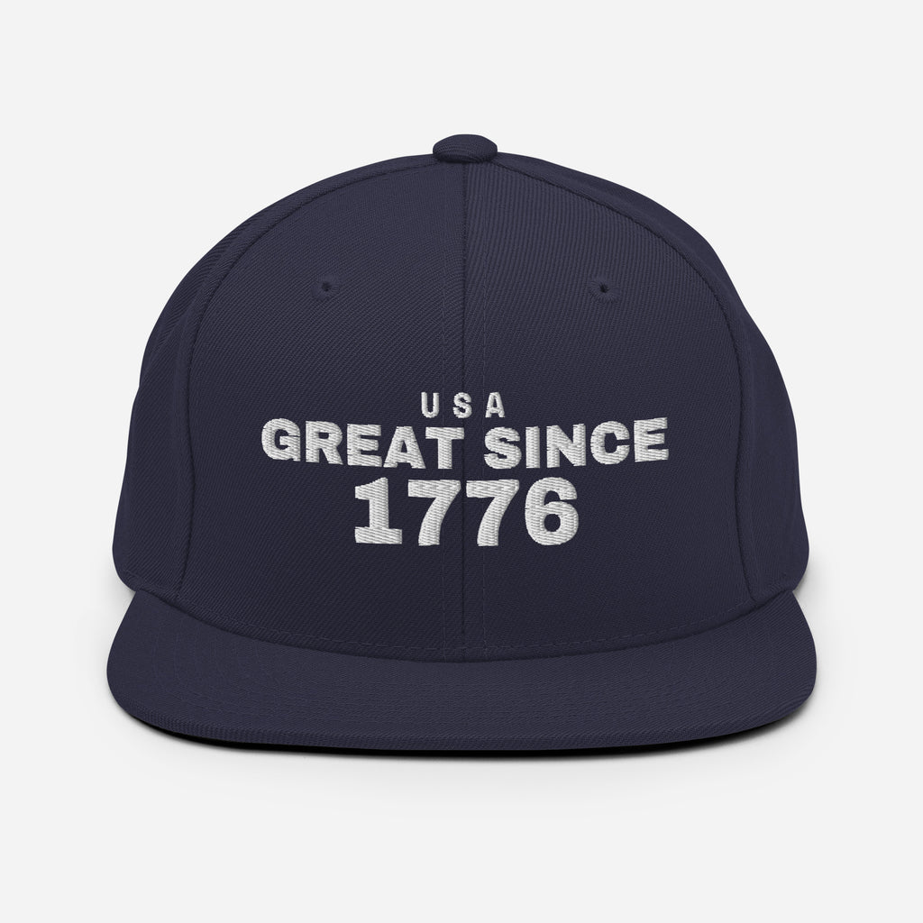 Navy and red snapback cap with USA GREAT SINCE 1776 embroidery