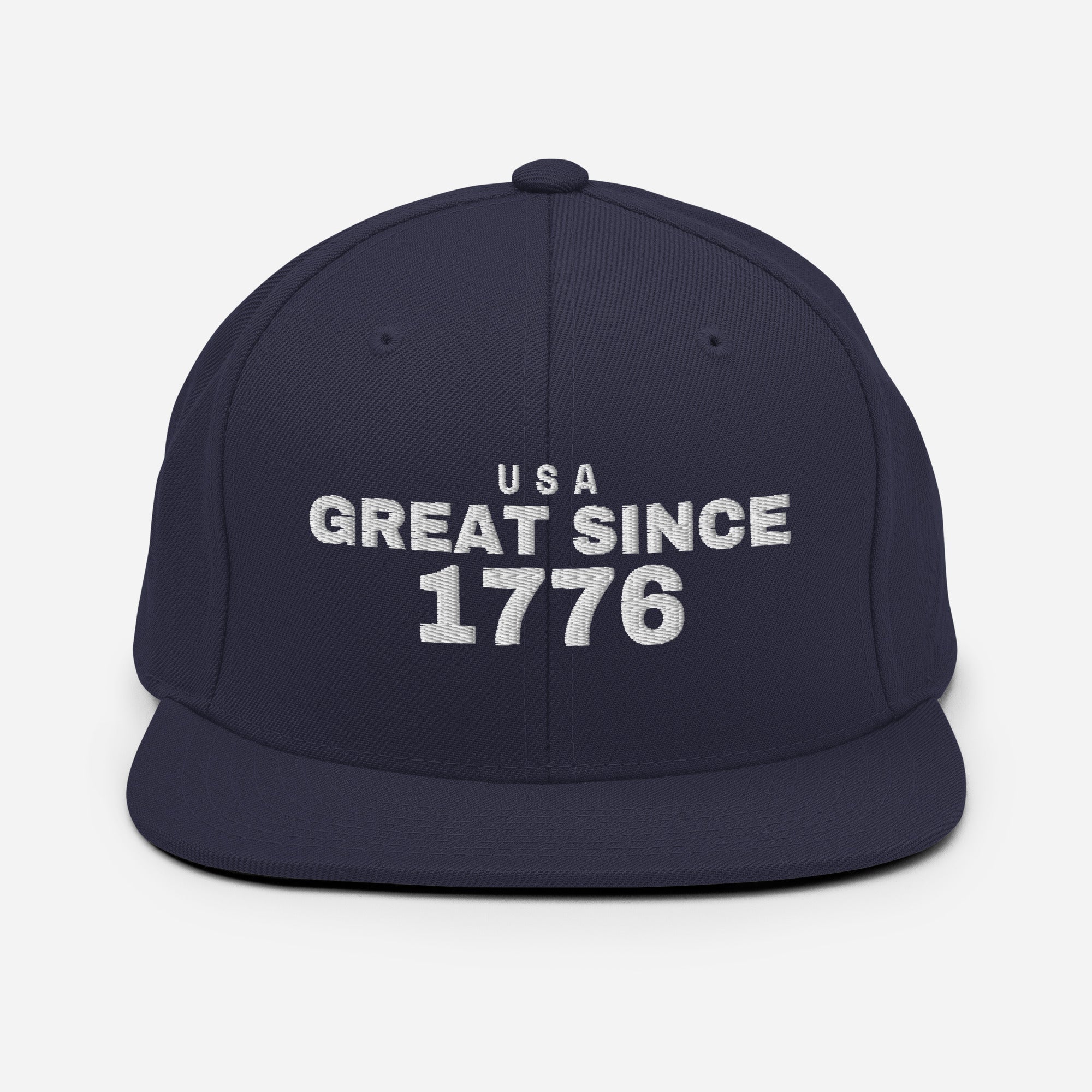 Navy and red snapback cap with USA GREAT SINCE 1776 embroidery