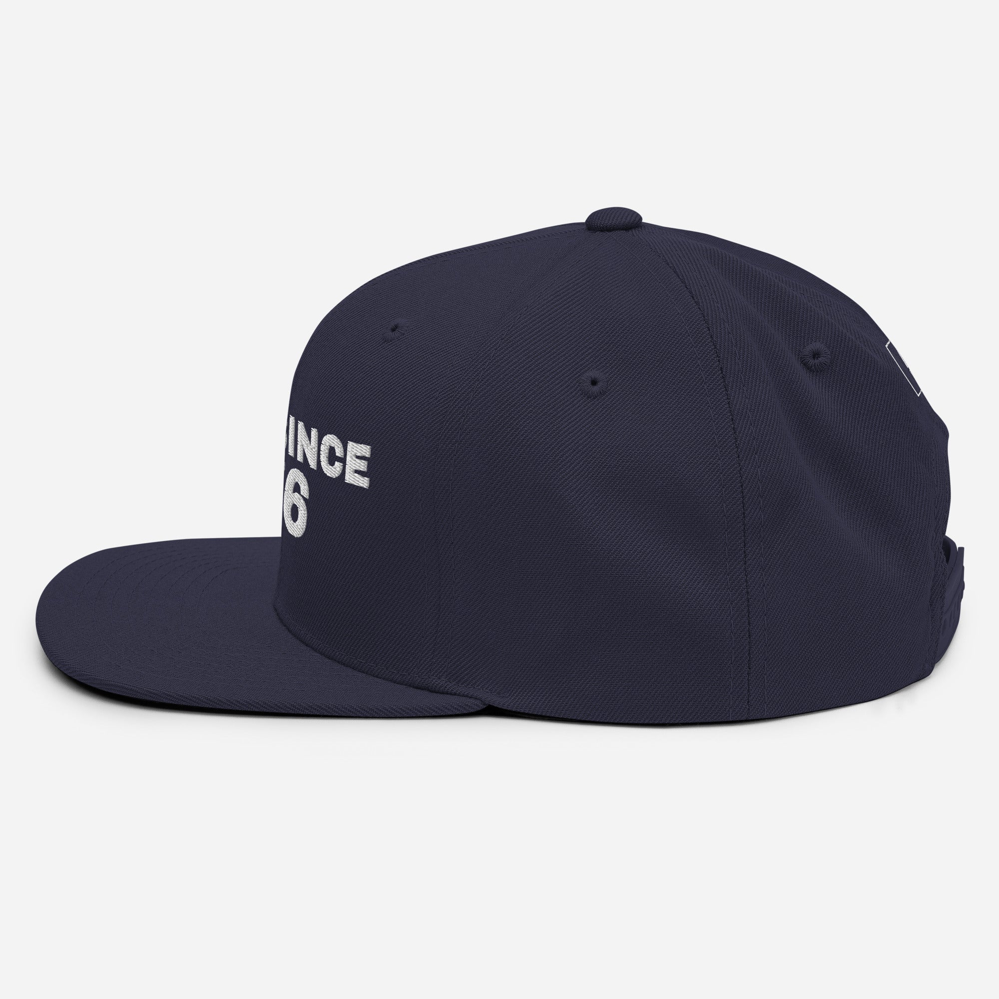 Navy and red snapback cap with USA GREAT SINCE 1776 embroidery