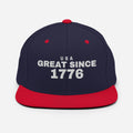 Navy and red snapback cap with USA GREAT SINCE 1776 embroidery