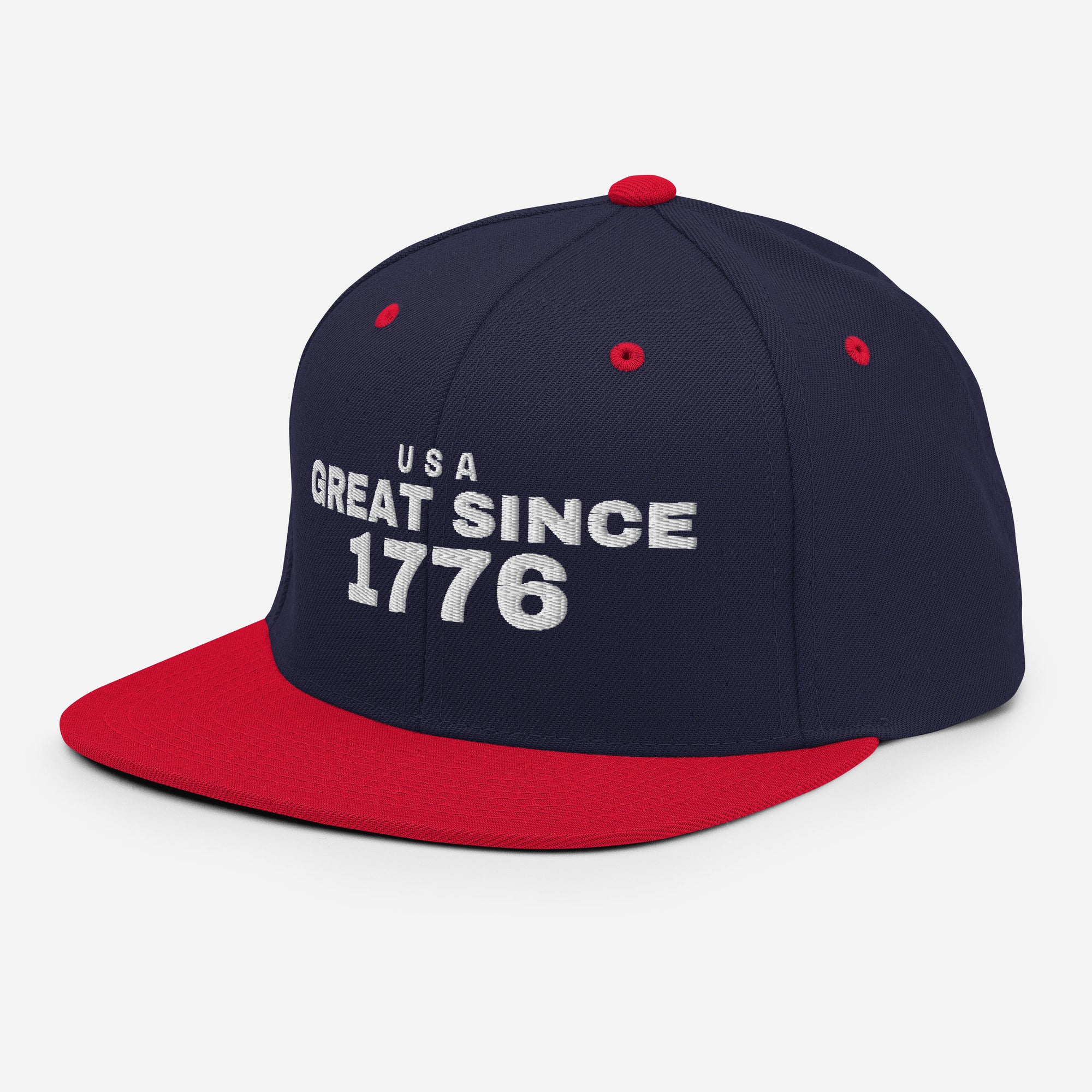 Navy and red snapback cap with USA GREAT SINCE 1776 embroidery