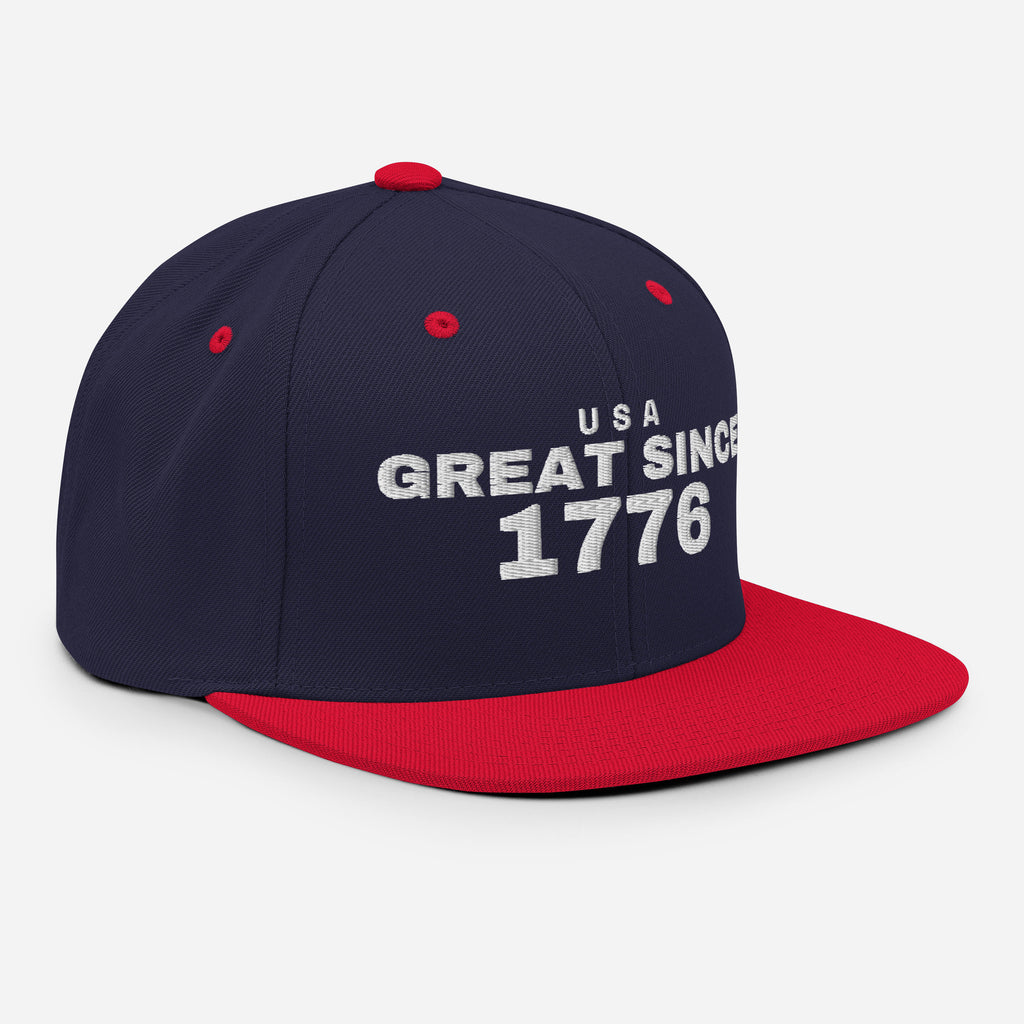 Navy and red snapback cap with USA GREAT SINCE 1776 embroidery