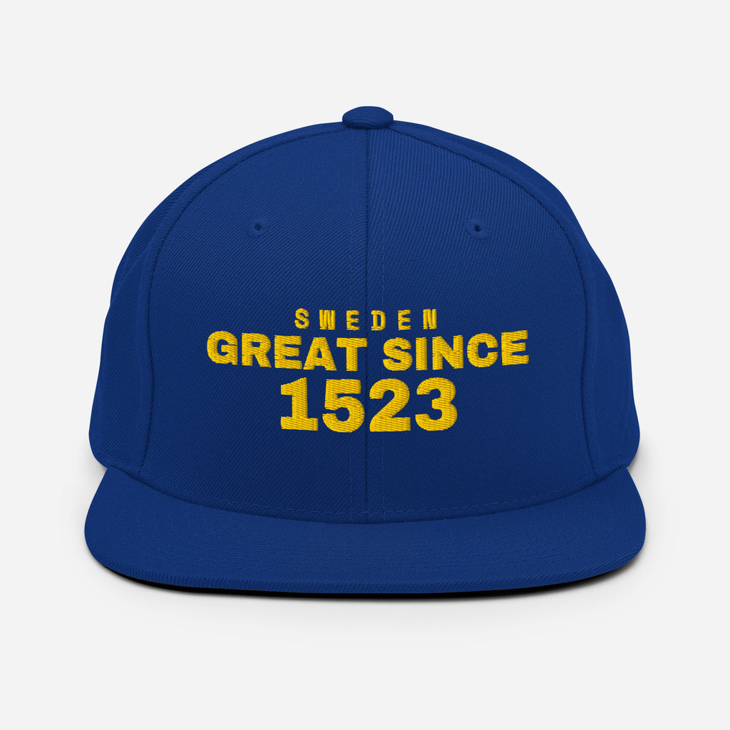Royal blue snapback cap with SWEDEN GREAT SINCE 1523 embroidery